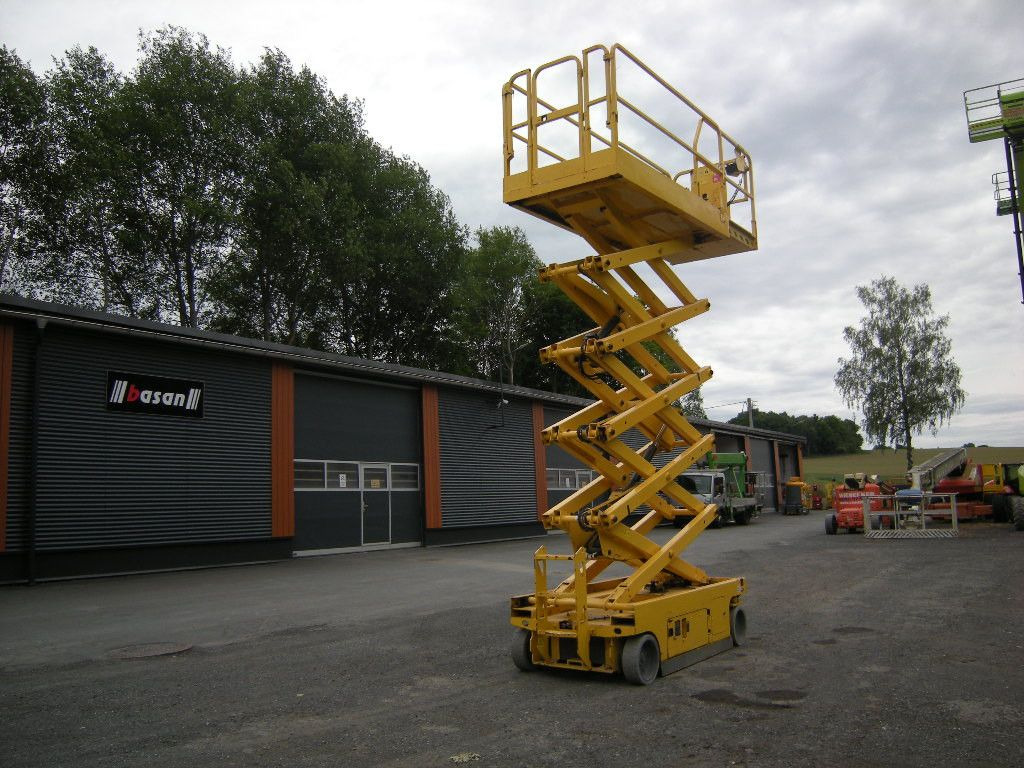 Genie GS 3246, Scherenarbeitsbühne Genie 11,9 m - Φορτηγό με εναέρια πλατφόρμα: φωτογραφία 1 Genie GS 3246, Scherenarbeitsbühne Genie 11,9 m - Φορτηγό με εναέρια πλατφόρμα: φωτογραφία 1