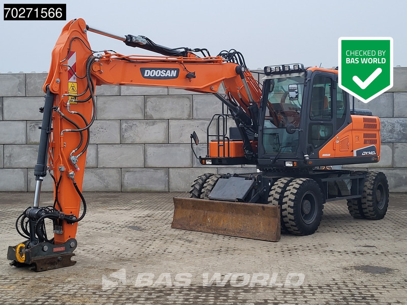 Doosan DX140 W-5 OIL QUICK - GERMAN - Τροχοφόρος εκσκαφέας: φωτογραφία 1 Doosan DX140 W-5 OIL QUICK - GERMAN - Τροχοφόρος εκσκαφέας: φωτογραφία 1