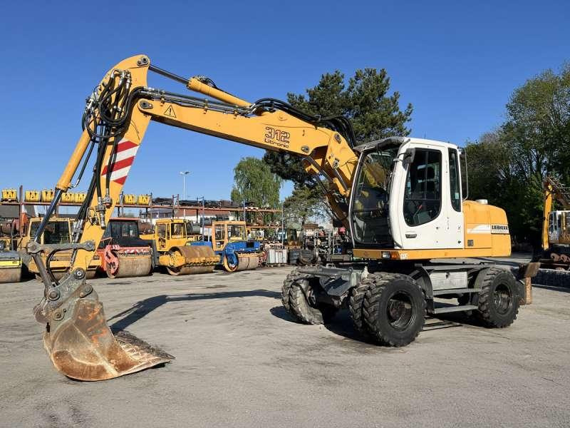 Liebherr A312 Litronic - Τροχοφόρος εκσκαφέας: φωτογραφία 3 Liebherr A312 Litronic - Τροχοφόρος εκσκαφέας: φωτογραφία 3