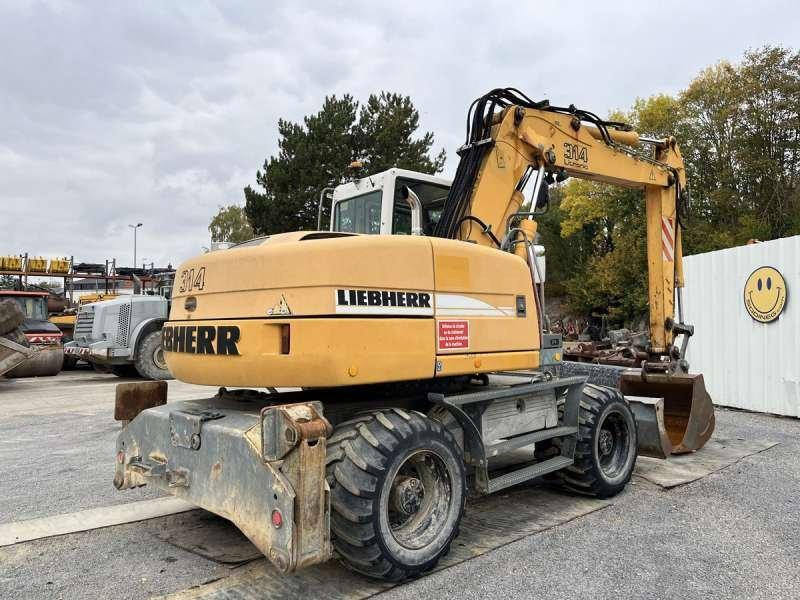 Liebherr A314 Litronic - Τροχοφόρος εκσκαφέας: φωτογραφία 5 Liebherr A314 Litronic - Τροχοφόρος εκσκαφέας: φωτογραφία 5