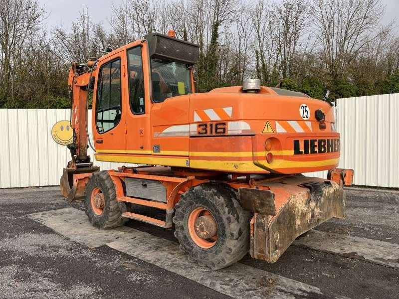 Liebherr A316 LITRONIC - Τροχοφόρος εκσκαφέας: φωτογραφία 4 Liebherr A316 LITRONIC - Τροχοφόρος εκσκαφέας: φωτογραφία 4