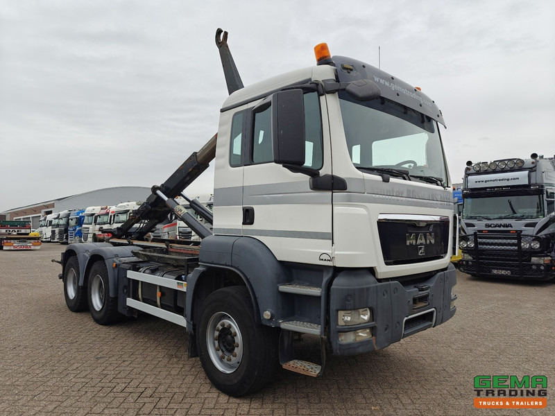 MAN TGS-TGX 26.440 6x4 Dagcabine Euro5 - AJK 20T HaakarmSysteem - Volledig Bladgeveerd - Naafreductie - Handgeschakeld - Φορτηγό φόρτωσης γάντζου: φωτογραφία 4 MAN TGS-TGX 26.440 6x4 Dagcabine Euro5 - AJK 20T HaakarmSysteem - Volledig Bladgeveerd - Naafreductie - Handgeschakeld - Φορτηγό φόρτωσης γάντζου: φωτογραφία 4