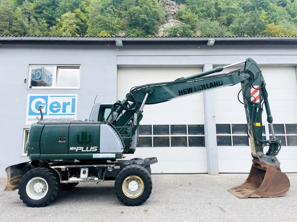 New Holland MH Plus (4054) - Τροχοφόρος εκσκαφέας: φωτογραφία 2 New Holland MH Plus (4054) - Τροχοφόρος εκσκαφέας: φωτογραφία 2