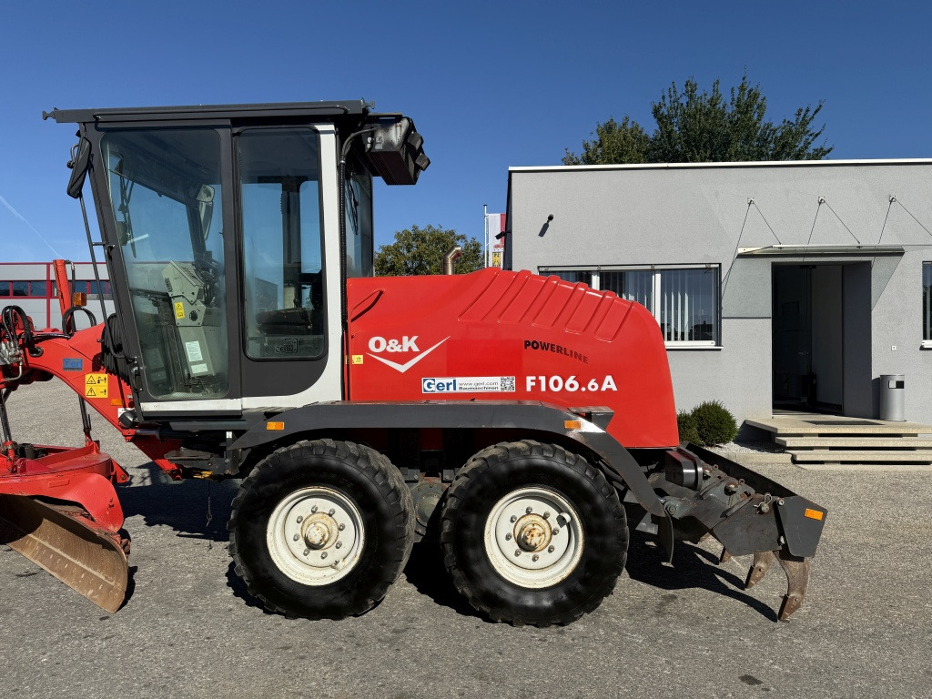 O&K – New Holland F 106.6 A (111700) - Γκρέιντερ: φωτογραφία 2 O&K – New Holland F 106.6 A (111700) - Γκρέιντερ: φωτογραφία 2