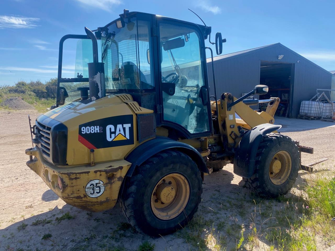 Caterpillar 908 H2 - Σπαστός φορτωτής: φωτογραφία 2 Caterpillar 908 H2 - Σπαστός φορτωτής: φωτογραφία 2