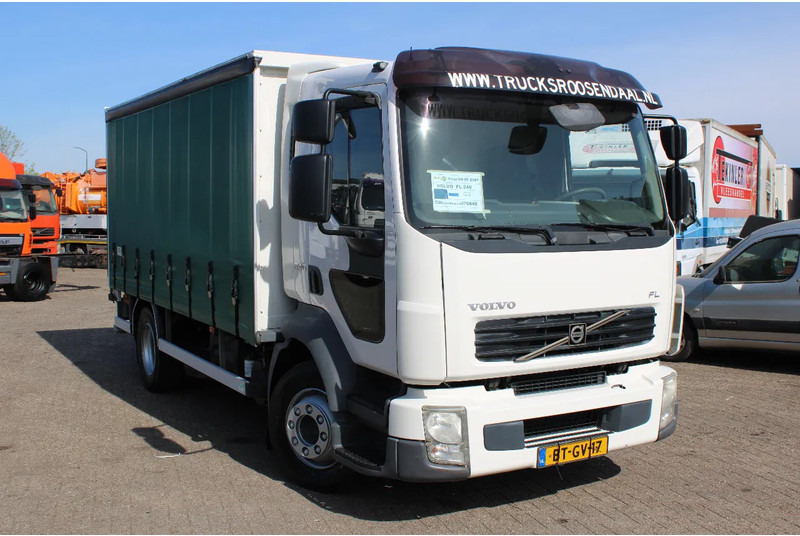 Volvo FL 12 .240 + LIFT + MANUAL - Φορτηγό μουσαμάς: φωτογραφία 2 Volvo FL 12 .240 + LIFT + MANUAL - Φορτηγό μουσαμάς: φωτογραφία 2