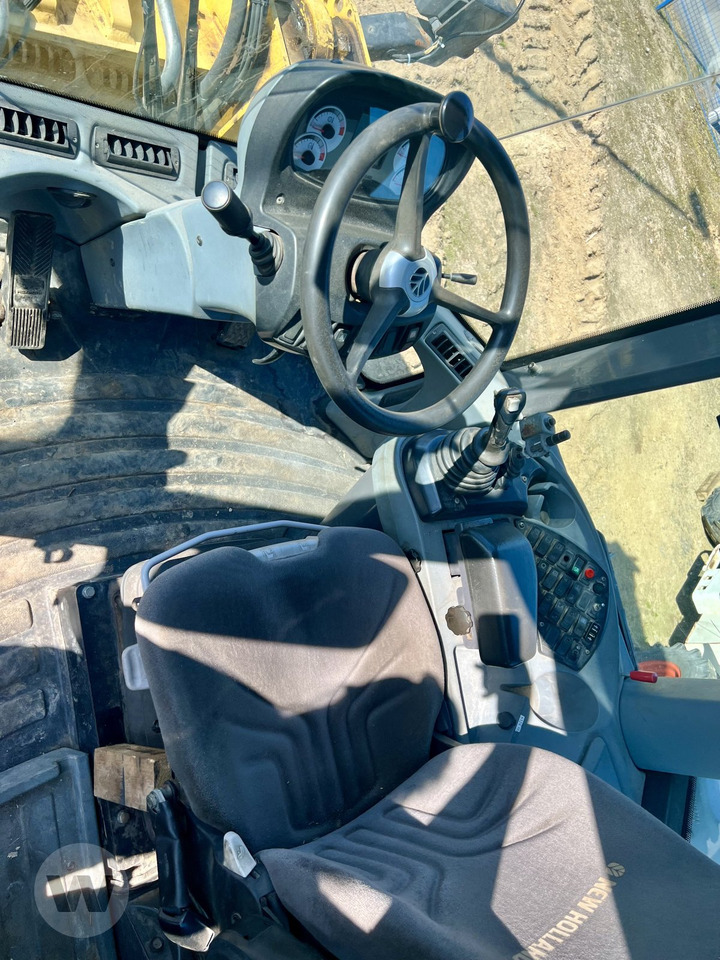 Ελαστιχοφόρος φορτωτής New Holland W 170 B: φωτογραφία 12