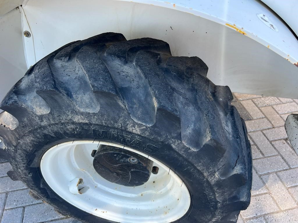 Ελαστιχοφόρος φορτωτής Used YANMAR 1201 loader: φωτογραφία 6