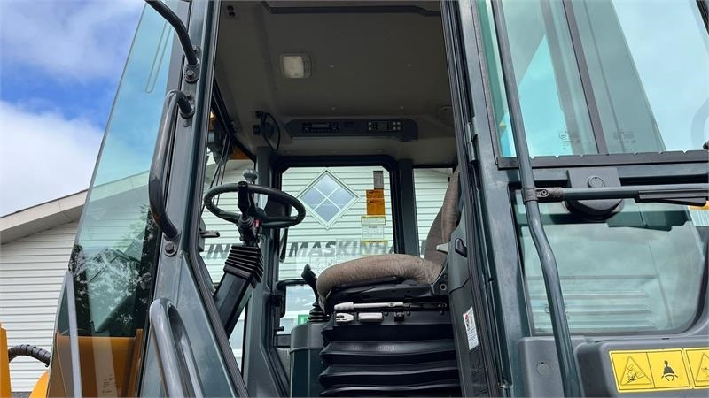 Hyundai 757-9A XTD med lang-arm. En-ejeres maskine med Loc - Ελαστιχοφόρος φορτωτής: φωτογραφία 2 Hyundai 757-9A XTD med lang-arm. En-ejeres maskine med Loc - Ελαστιχοφόρος φορτωτής: φωτογραφία 2
