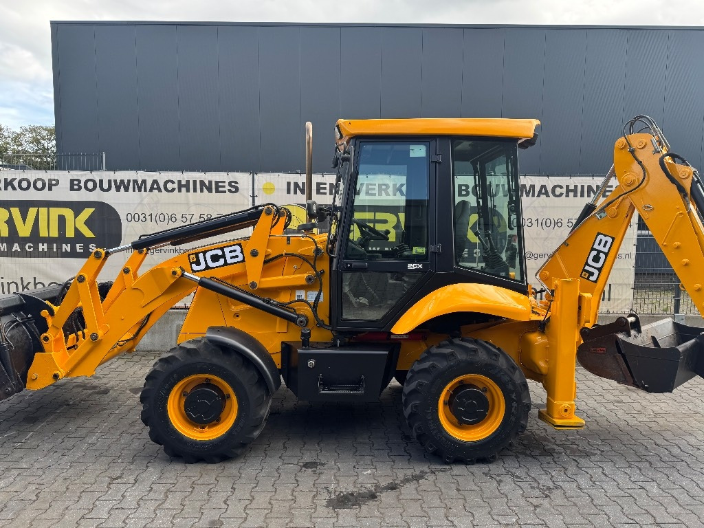 JCB 2 CX - Φορτωτής εκσκαφέας: φωτογραφία 1 JCB 2 CX - Φορτωτής εκσκαφέας: φωτογραφία 1