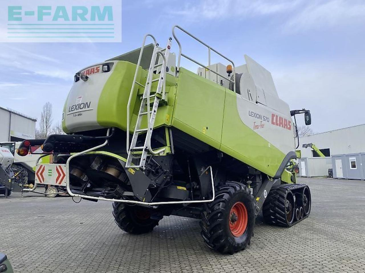CLAAS lexion 570 tt mit v900+tw - Θεριζοαλωνιστική μηχανή: φωτογραφία 2 CLAAS lexion 570 tt mit v900+tw - Θεριζοαλωνιστική μηχανή: φωτογραφία 2