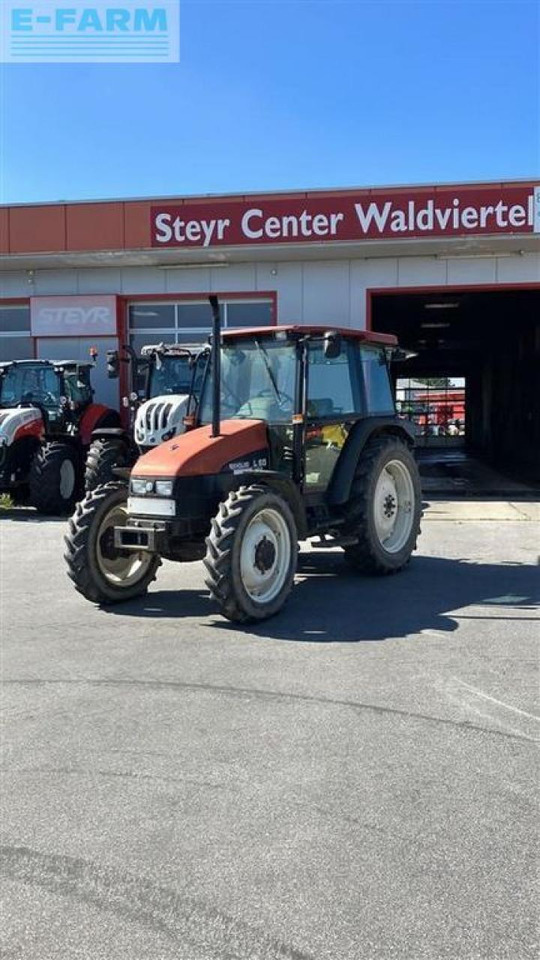 New Holland l65 - Τρακτέρ: φωτογραφία 1 New Holland l65 - Τρακτέρ: φωτογραφία 1