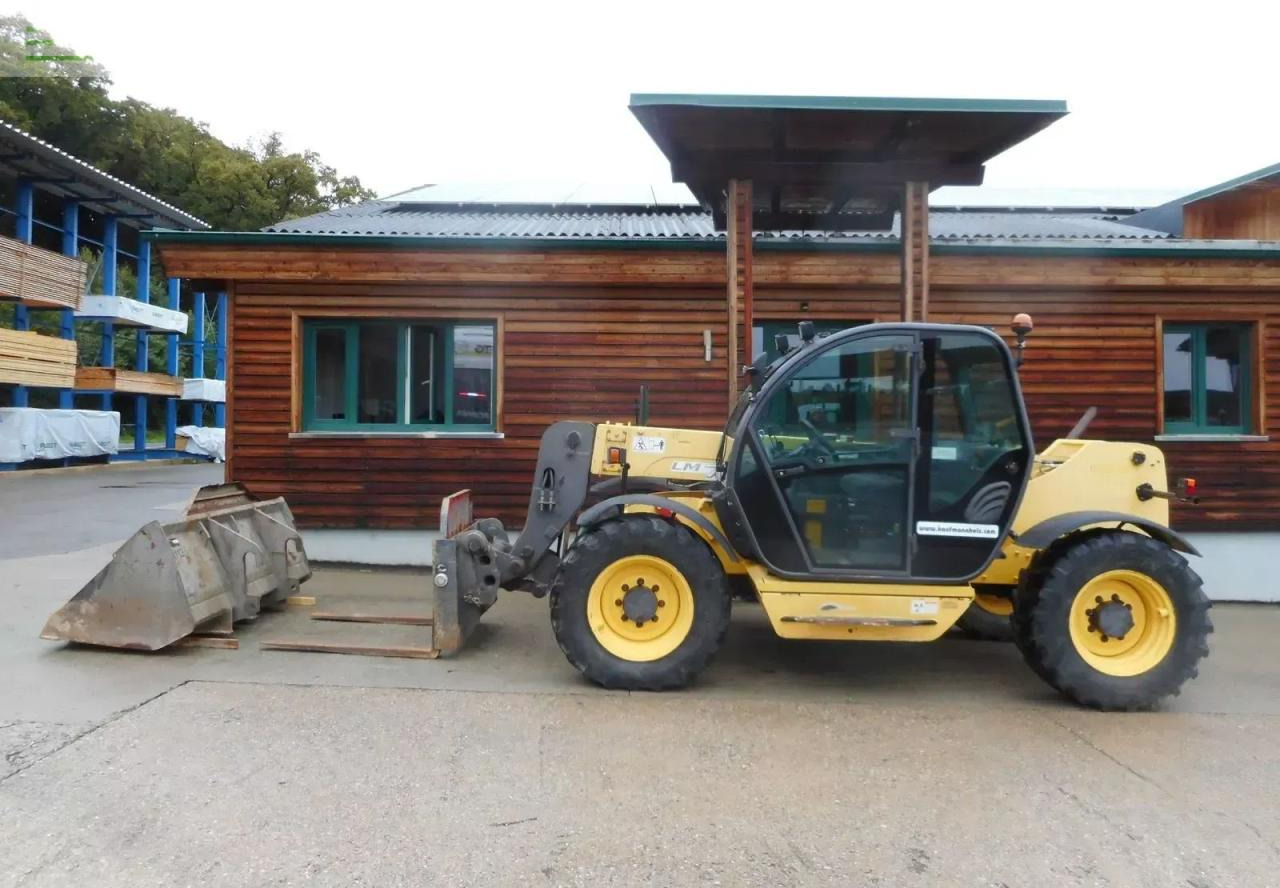 New Holland lm732 mit schaufel und gabel - Τηλεσκοπικός φορτωτής: φωτογραφία 1 New Holland lm732 mit schaufel und gabel - Τηλεσκοπικός φορτωτής: φωτογραφία 1