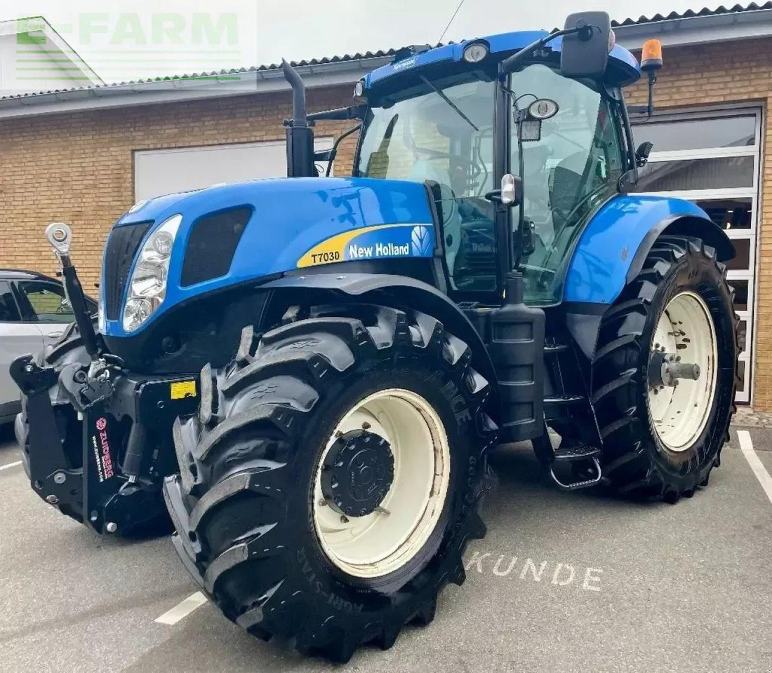 New Holland t 7030 - Τρακτέρ: φωτογραφία 1 New Holland t 7030 - Τρακτέρ: φωτογραφία 1