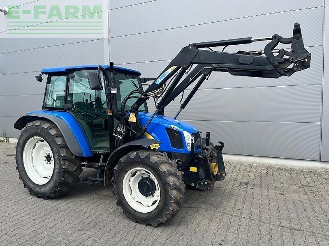 New Holland tl 90 a A - Τρακτέρ: φωτογραφία 1 New Holland tl 90 a A - Τρακτέρ: φωτογραφία 1