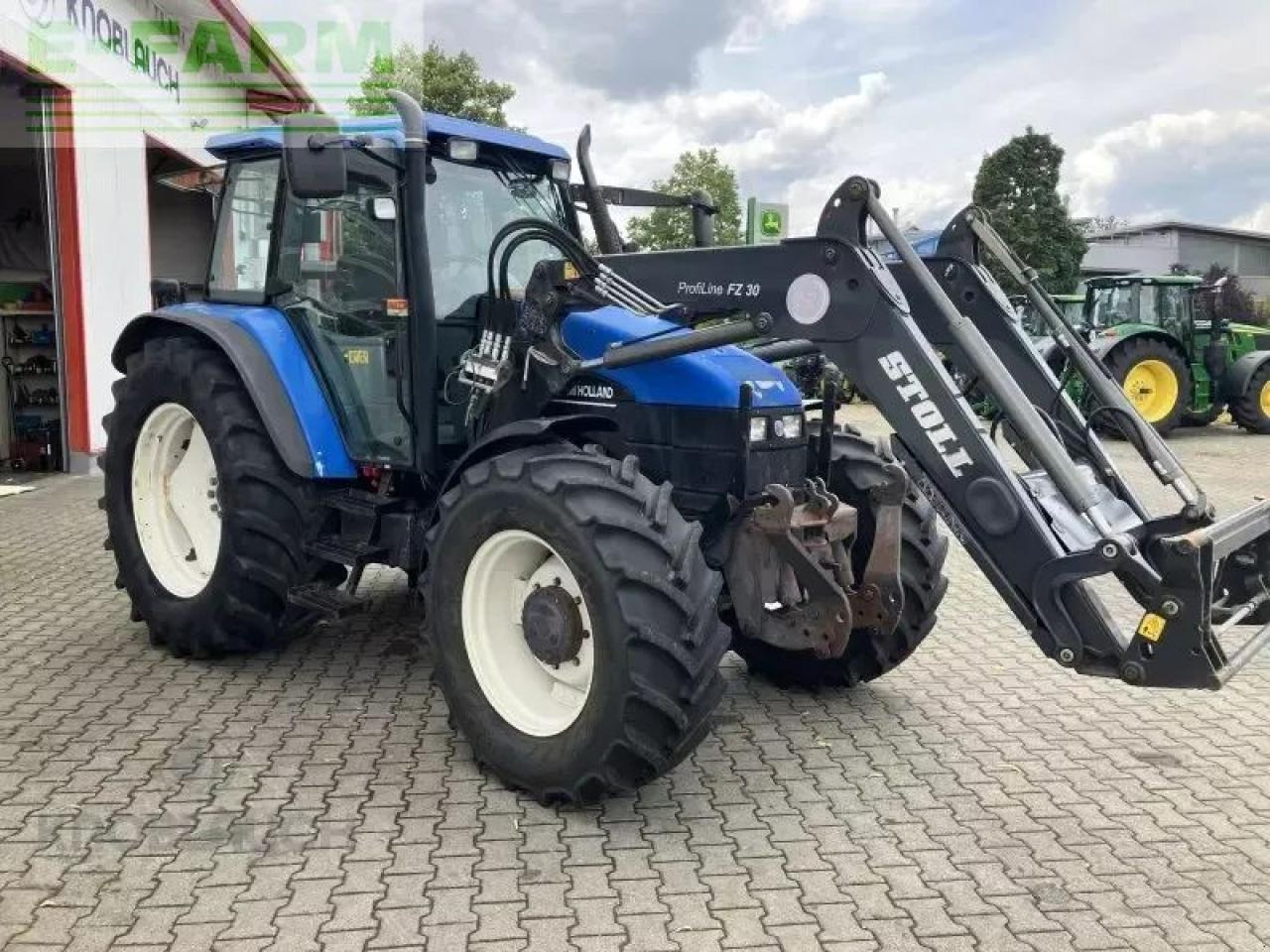 New Holland ts 115 - Τρακτέρ: φωτογραφία 3 New Holland ts 115 - Τρακτέρ: φωτογραφία 3