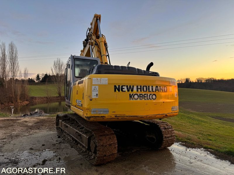 Εκσκαφέας PELLE NEW HOLLAND E215B - 2009 - 11000 heures: φωτογραφία 6 Εκσκαφέας PELLE NEW HOLLAND E215B - 2009 - 11000 heures: φωτογραφία 6