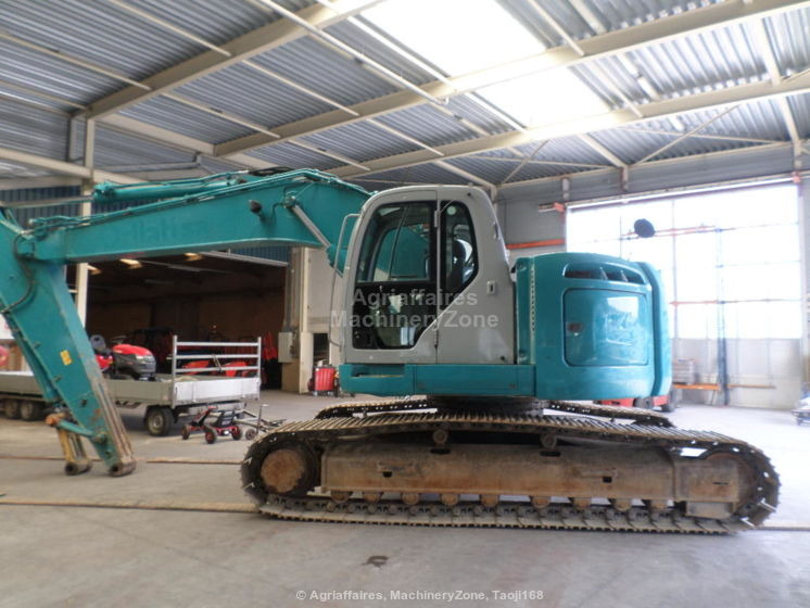New Holland Kobelco Kobelco E 235 BSR-2 E 235 BSR-2 - Ερπυστριοφόρος εκσκαφέας: φωτογραφία 1 New Holland Kobelco Kobelco E 235 BSR-2 E 235 BSR-2 - Ερπυστριοφόρος εκσκαφέας: φωτογραφία 1