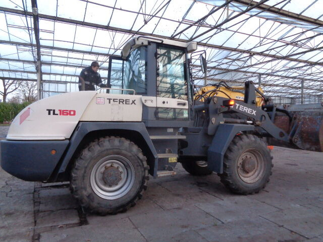 Terex TL160 - Ελαστιχοφόρος φορτωτής: φωτογραφία 1 Terex TL160 - Ελαστιχοφόρος φορτωτής: φωτογραφία 1