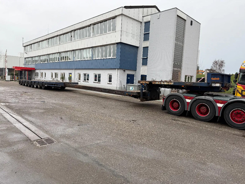 Nooteboom MC0 105-08V, 2 EXTENDABLE 12.35 + 12,05 8 AXLE, 2 LIFT AXLES, 7 AXLE STEERING, REMOTE CONTROLE - Επικαθήμενο με χαμηλό δάπεδο: φωτογραφία 2 Nooteboom MC0 105-08V, 2 EXTENDABLE 12.35 + 12,05 8 AXLE, 2 LIFT AXLES, 7 AXLE STEERING, REMOTE CONTROLE - Επικαθήμενο με χαμηλό δάπεδο: φωτογραφία 2