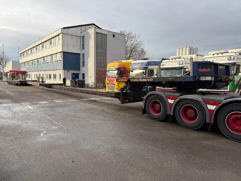 Nooteboom MC0 105-08V, 2 EXTENDABLE 12.35 + 12,05 8 AXLE, 2 LIFT AXLES, 7 AXLE STEERING, REMOTE CONTROLE - Επικαθήμενο με χαμηλό δάπεδο: φωτογραφία 1 Nooteboom MC0 105-08V, 2 EXTENDABLE 12.35 + 12,05 8 AXLE, 2 LIFT AXLES, 7 AXLE STEERING, REMOTE CONTROLE - Επικαθήμενο με χαμηλό δάπεδο: φωτογραφία 1