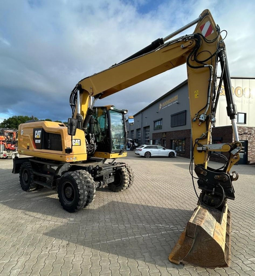 CAT M 318 F - Τροχοφόρος εκσκαφέας: φωτογραφία 2 CAT M 318 F - Τροχοφόρος εκσκαφέας: φωτογραφία 2