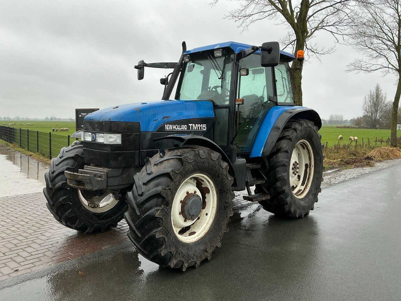 2002 NEW HOLLAND TM 115 ALL-WHEEL DRIVE FARM TRACTOR - Τρακτέρ: φωτογραφία 1 2002 NEW HOLLAND TM 115 ALL-WHEEL DRIVE FARM TRACTOR - Τρακτέρ: φωτογραφία 1