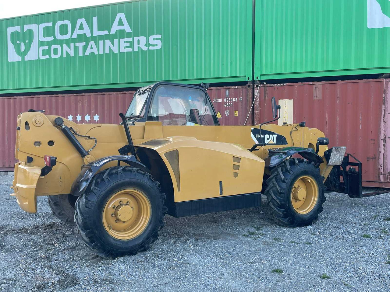 Ελαστιχοφόρος φορτωτής Caterpillar TH414: φωτογραφία 11