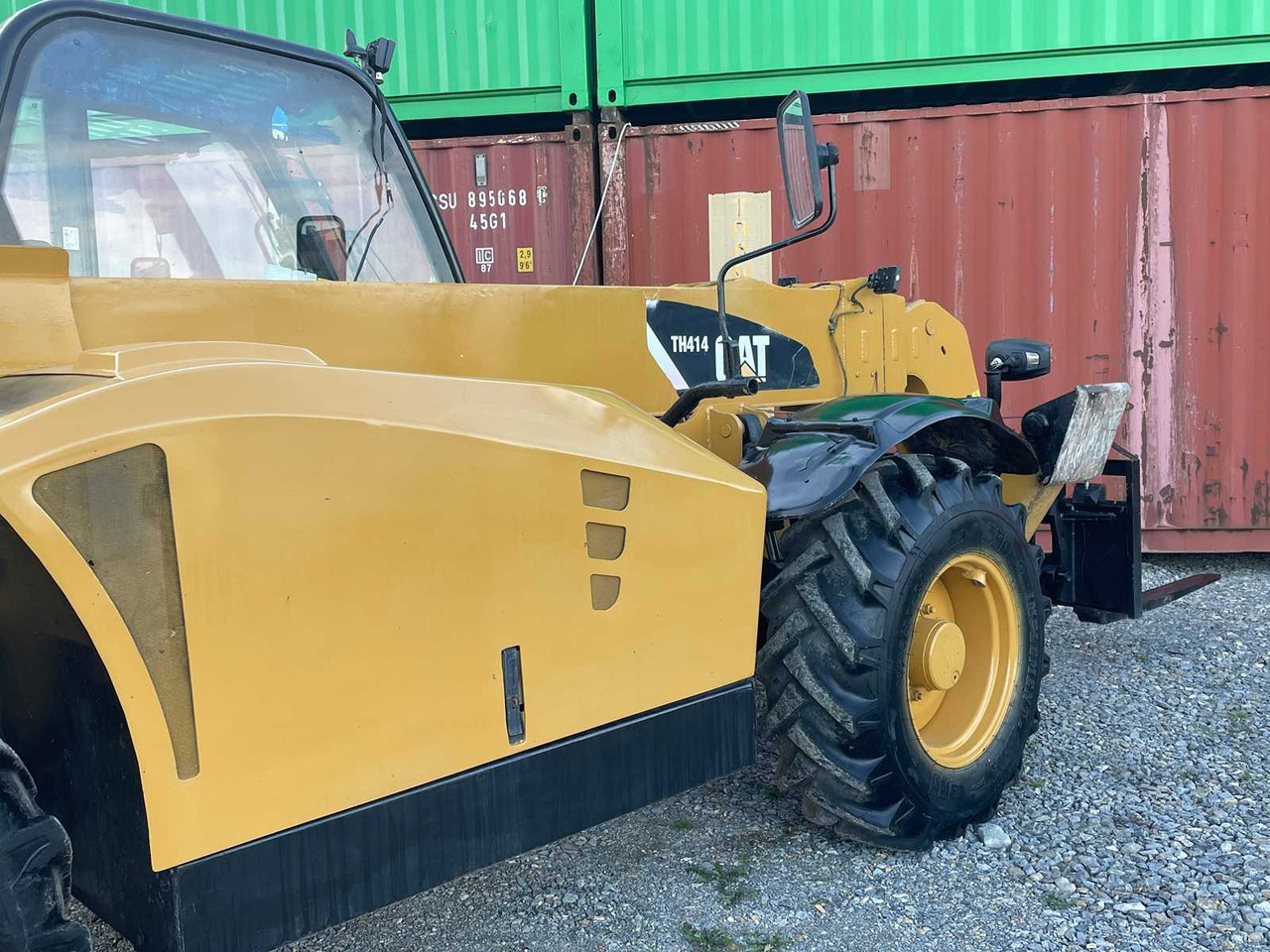 Ελαστιχοφόρος φορτωτής Caterpillar TH414: φωτογραφία 20