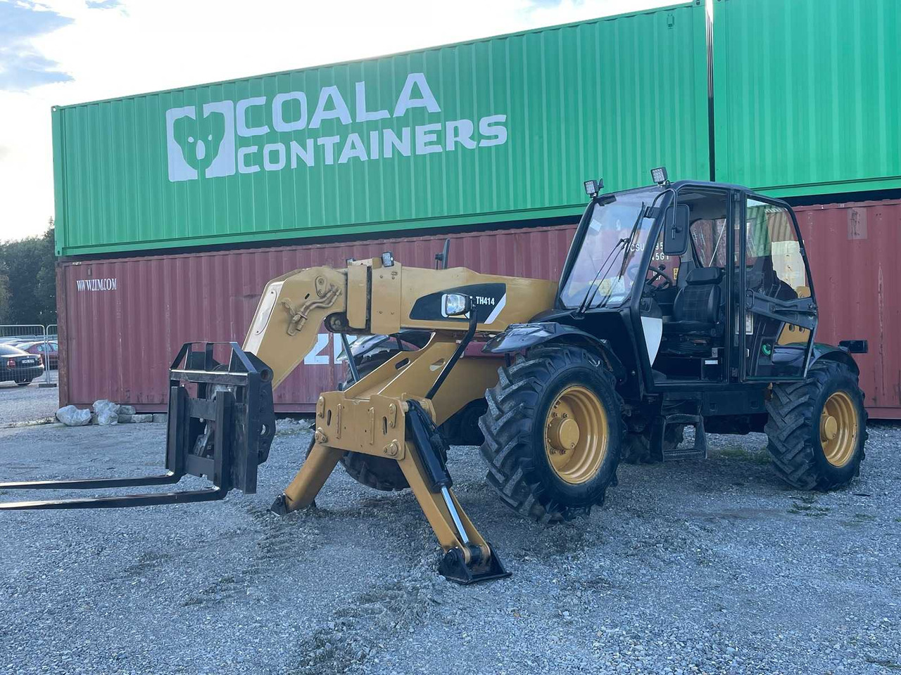 Ελαστιχοφόρος φορτωτής Caterpillar TH414: φωτογραφία 29