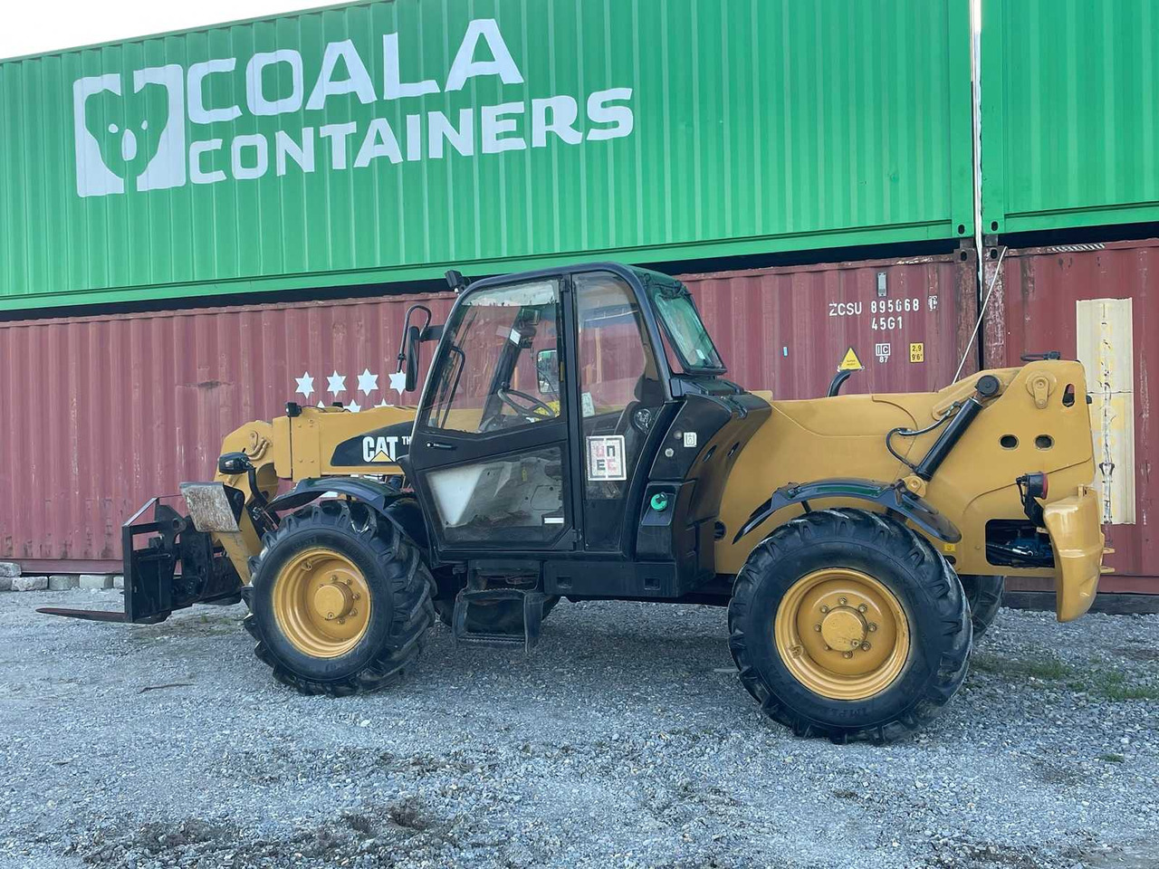 Ελαστιχοφόρος φορτωτής Caterpillar TH414: φωτογραφία 9