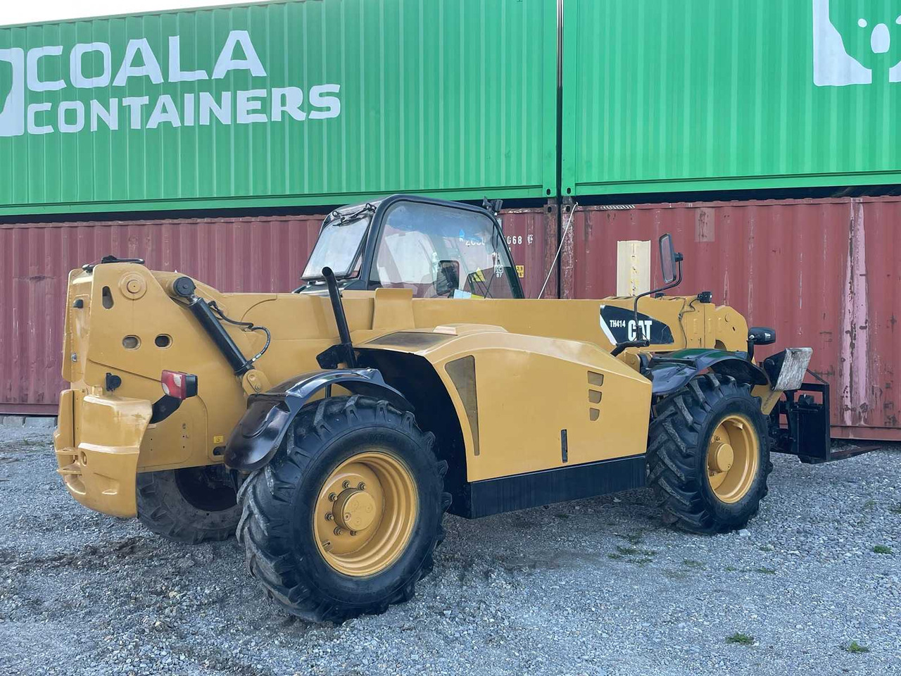 Ελαστιχοφόρος φορτωτής Caterpillar TH414: φωτογραφία 10