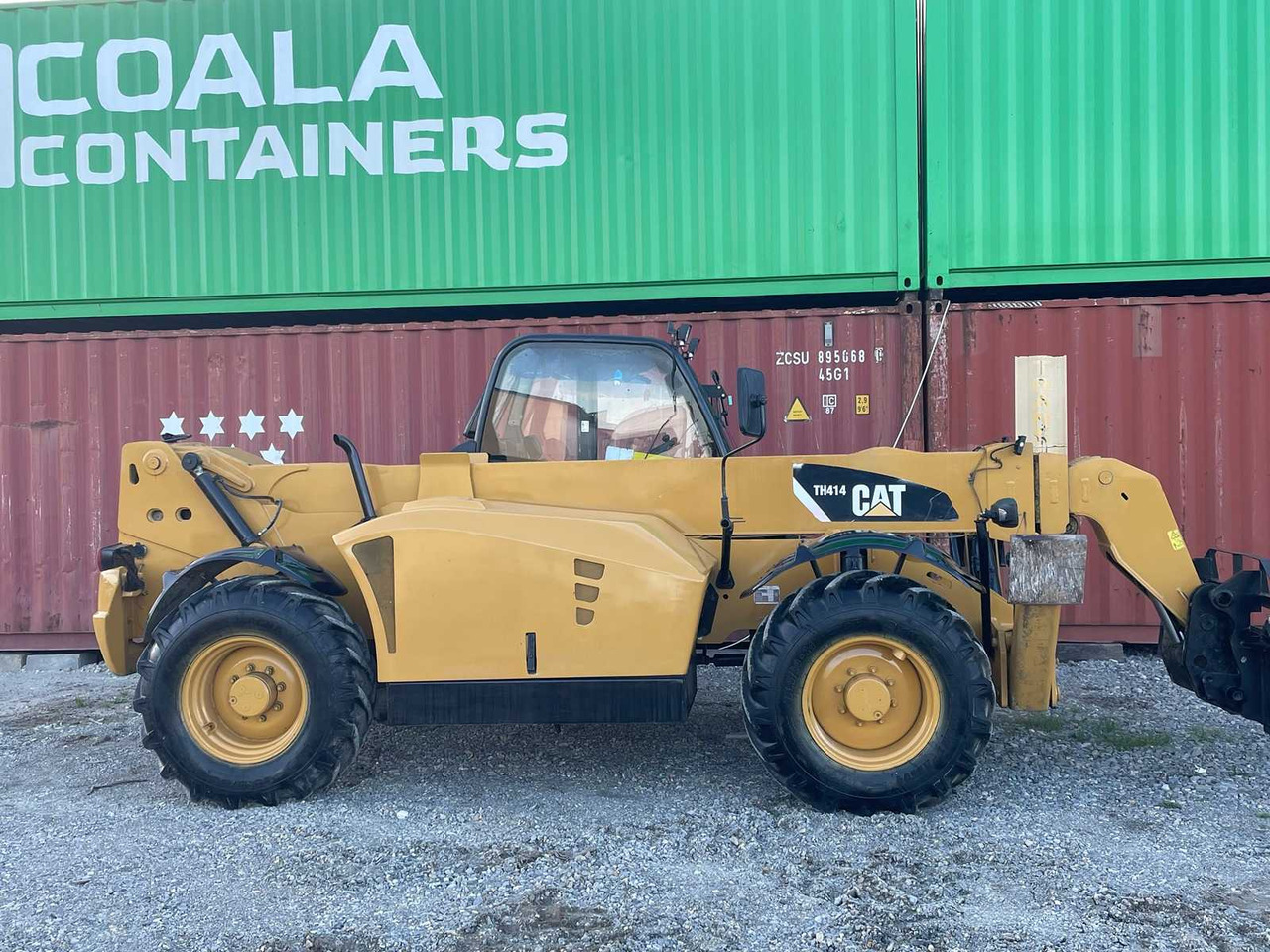 Ελαστιχοφόρος φορτωτής Caterpillar TH414: φωτογραφία 14