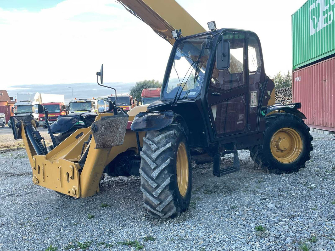 Ελαστιχοφόρος φορτωτής Caterpillar TH414: φωτογραφία 16