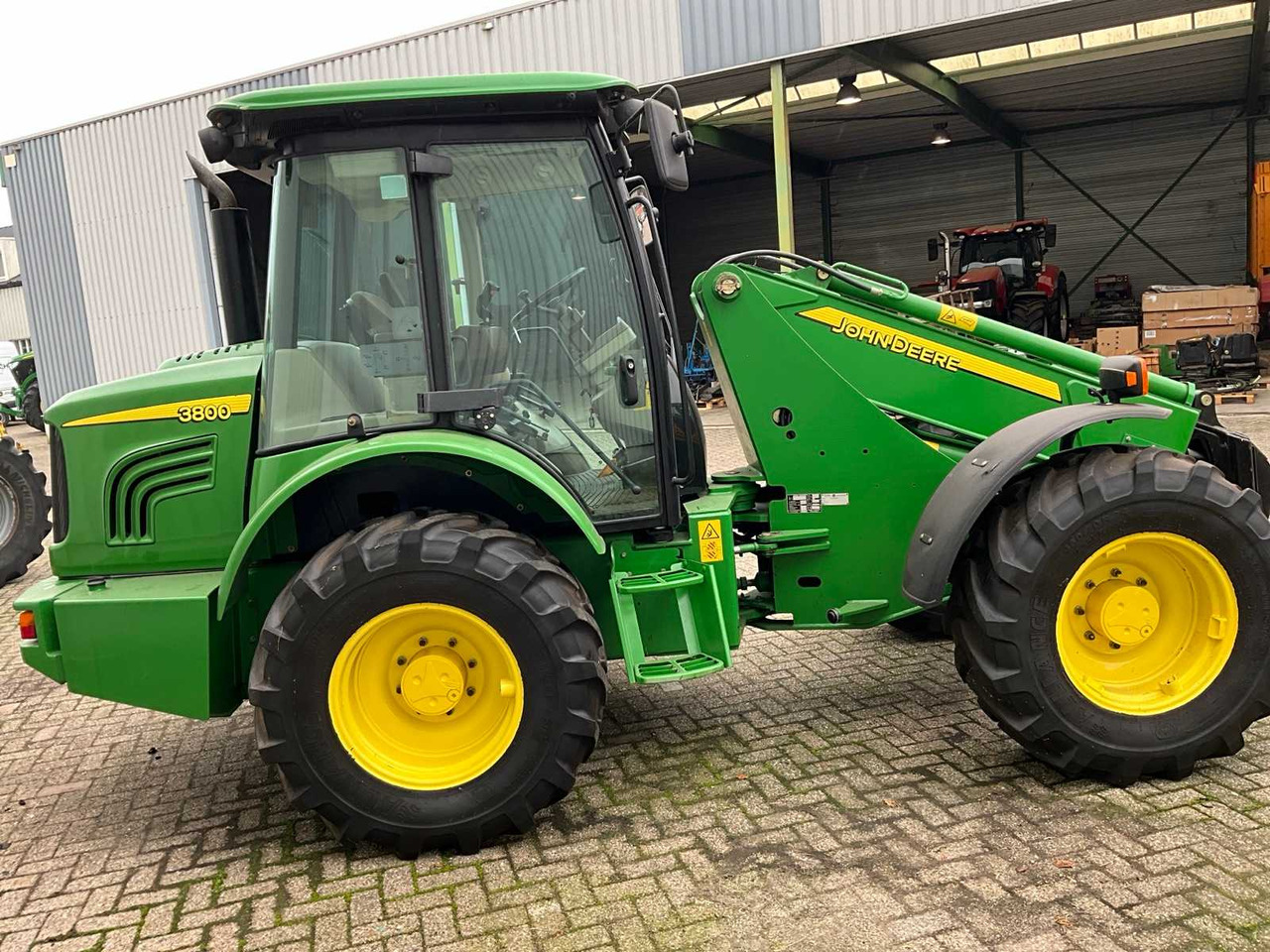 John Deere 3800 - Ελαστιχοφόρος φορτωτής: φωτογραφία 3 John Deere 3800 - Ελαστιχοφόρος φορτωτής: φωτογραφία 3