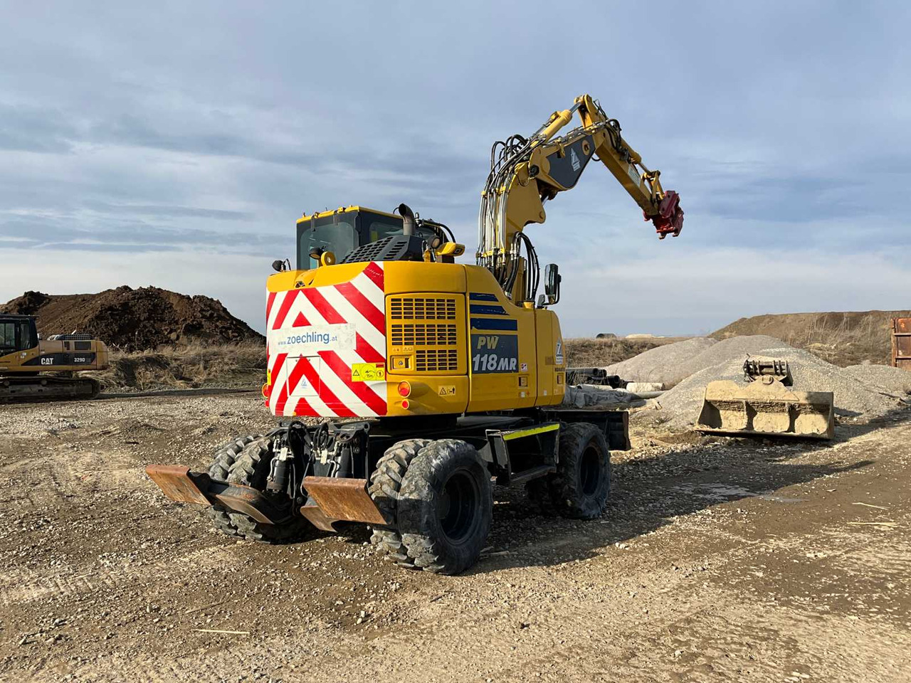 Komatsu PW118MR-11 - Τροχοφόρος εκσκαφέας: φωτογραφία 1 Komatsu PW118MR-11 - Τροχοφόρος εκσκαφέας: φωτογραφία 1