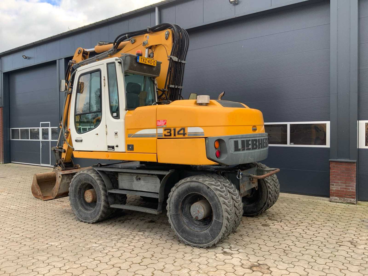 Liebherr A314 Litronic - Τροχοφόρος εκσκαφέας: φωτογραφία 5 Liebherr A314 Litronic - Τροχοφόρος εκσκαφέας: φωτογραφία 5