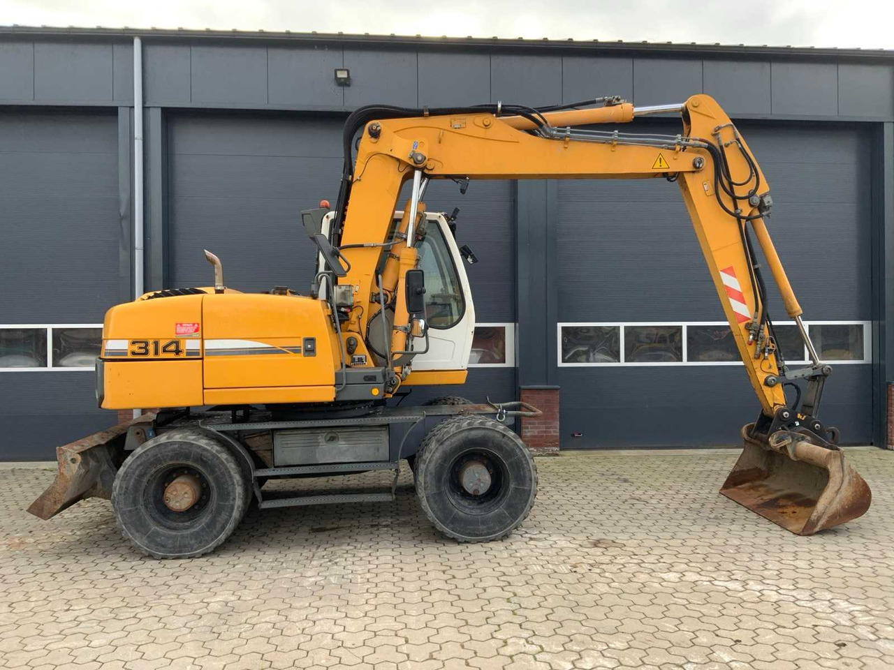 Liebherr A314 Litronic - Τροχοφόρος εκσκαφέας: φωτογραφία 4 Liebherr A314 Litronic - Τροχοφόρος εκσκαφέας: φωτογραφία 4