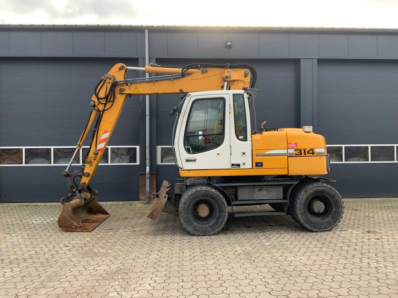 Liebherr A314 Litronic - Τροχοφόρος εκσκαφέας: φωτογραφία 3 Liebherr A314 Litronic - Τροχοφόρος εκσκαφέας: φωτογραφία 3
