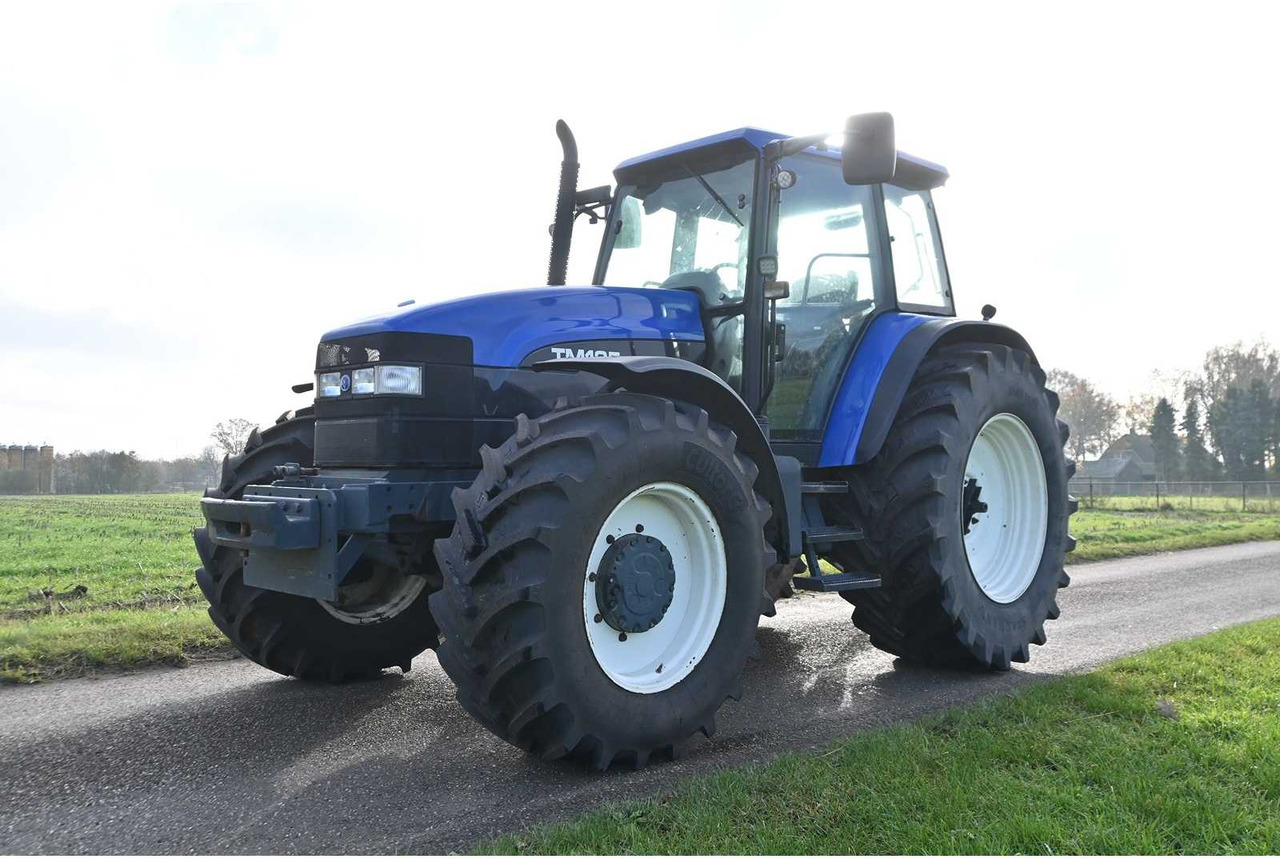 NEW HOLLAND - 1998 - TM135 - ALL-WHEEL DRIVE FARM TRACTOR - Τρακτέρ: φωτογραφία 1 NEW HOLLAND - 1998 - TM135 - ALL-WHEEL DRIVE FARM TRACTOR - Τρακτέρ: φωτογραφία 1