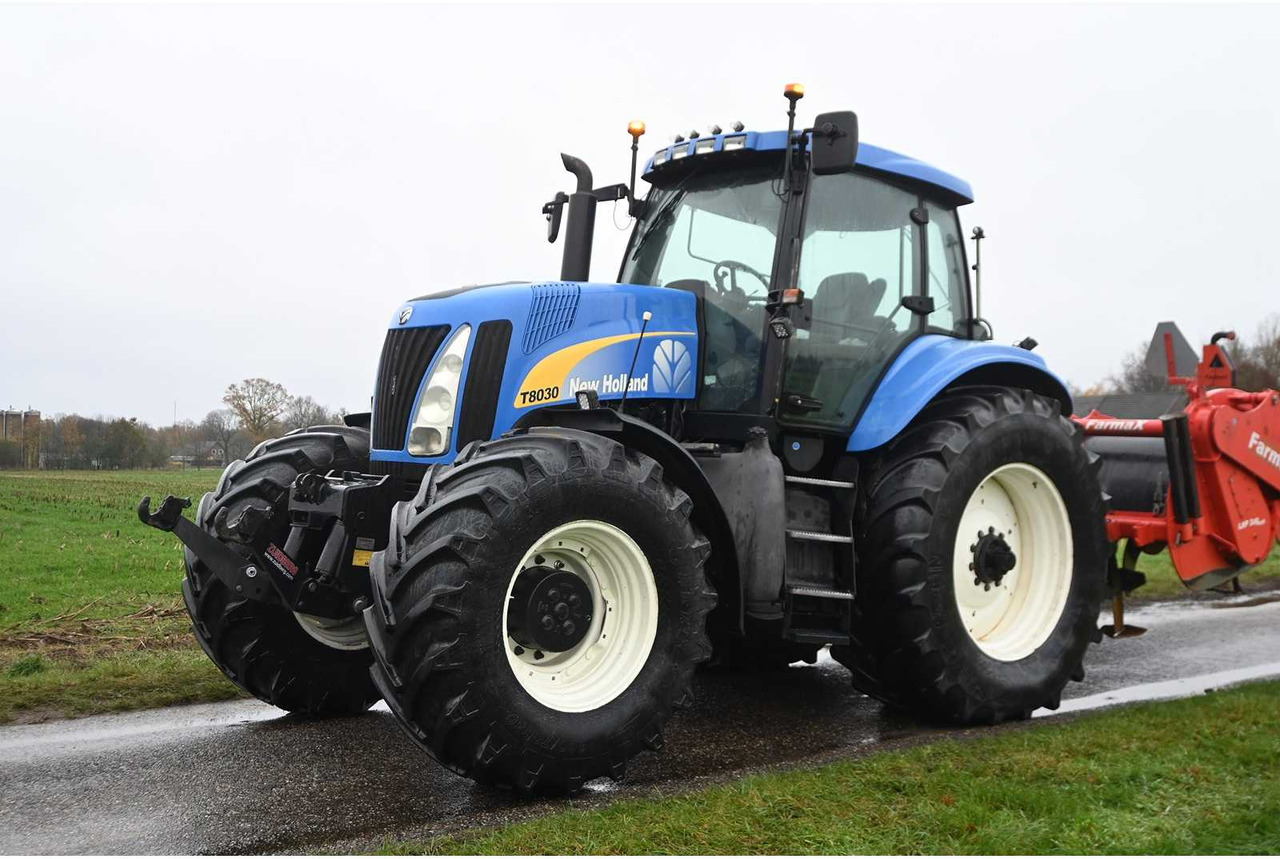 NEW HOLLAND - 2003 - TG230 - ALL-WHEEL DRIVE FARM TRACTOR - Τρακτέρ: φωτογραφία 1 NEW HOLLAND - 2003 - TG230 - ALL-WHEEL DRIVE FARM TRACTOR - Τρακτέρ: φωτογραφία 1