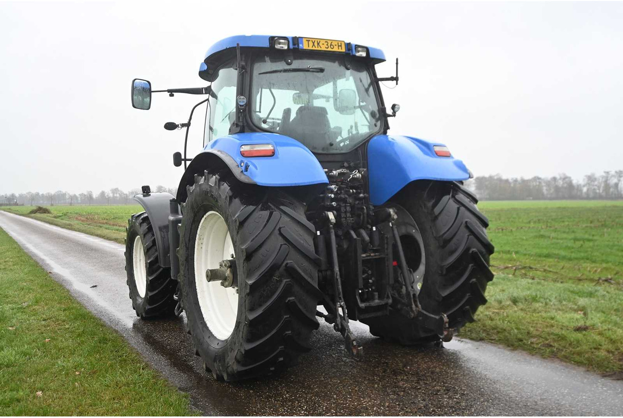 NEW HOLLAND - 2007 - T7030 - ALL-WHEEL DRIVE FARM TRACTOR - Τρακτέρ: φωτογραφία 5 NEW HOLLAND - 2007 - T7030 - ALL-WHEEL DRIVE FARM TRACTOR - Τρακτέρ: φωτογραφία 5