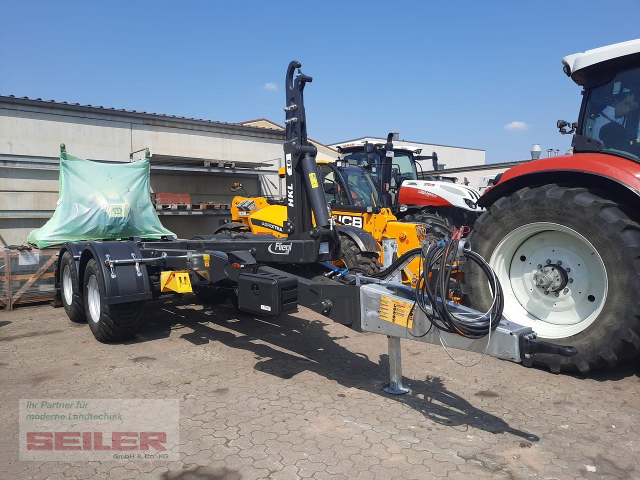 Fliegl HKL 18 Abrollkipper - Ρυμούλκα γάντζος/ Αλυσιδάκι: φωτογραφία 1 Fliegl HKL 18 Abrollkipper - Ρυμούλκα γάντζος/ Αλυσιδάκι: φωτογραφία 1