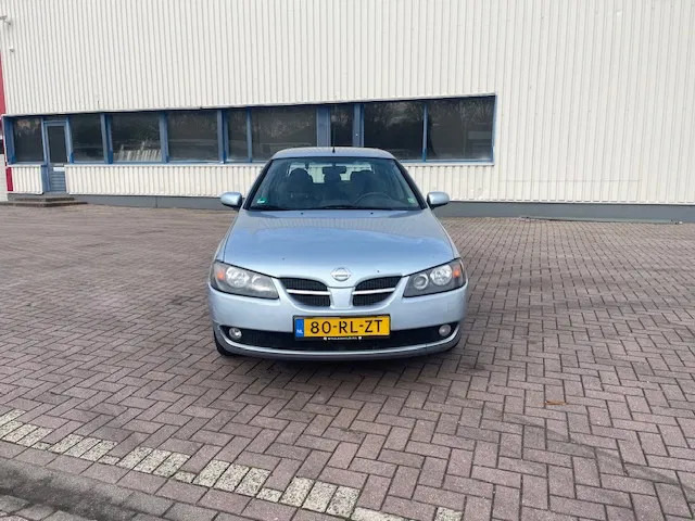 Nissan Almera Airco Manual gear APK Cruise control - Hatchback: φωτογραφία 2 Nissan Almera Airco Manual gear APK Cruise control - Hatchback: φωτογραφία 2
