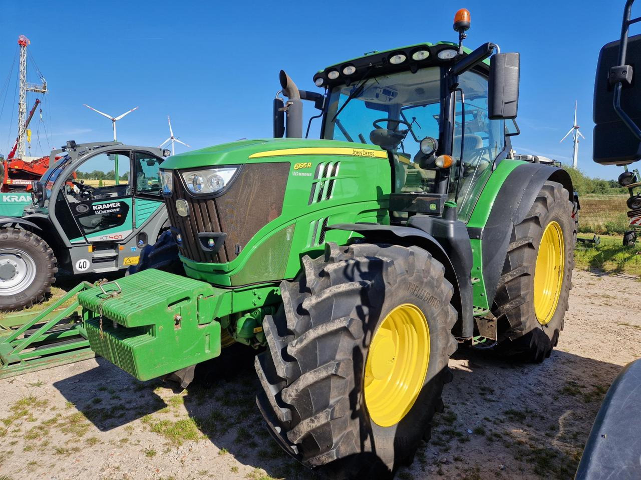 John Deere 6195R - Τρακτέρ: φωτογραφία 1 John Deere 6195R - Τρακτέρ: φωτογραφία 1