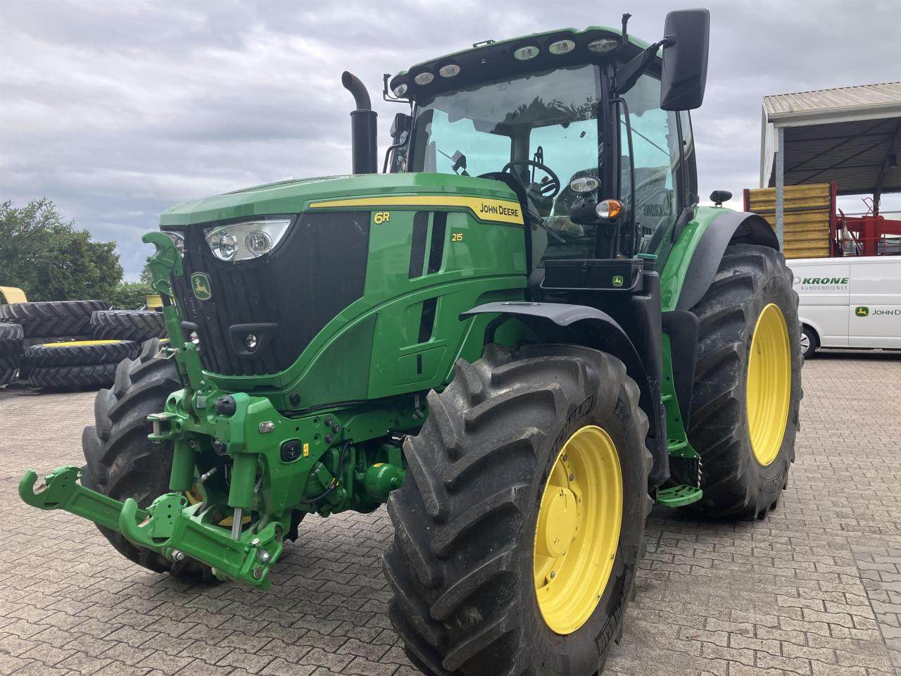 John Deere 6R 215 - Τρακτέρ: φωτογραφία 1 John Deere 6R 215 - Τρακτέρ: φωτογραφία 1