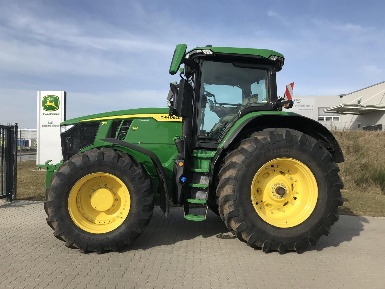 John Deere 7R 310 - Τρακτέρ: φωτογραφία 1 John Deere 7R 310 - Τρακτέρ: φωτογραφία 1