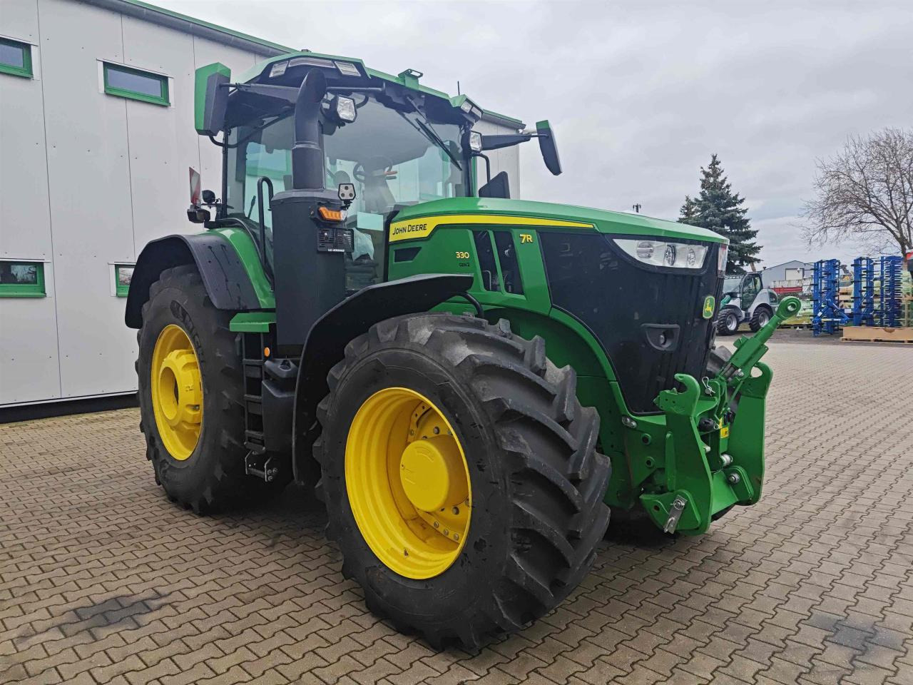 John Deere 7R 330 - Τρακτέρ: φωτογραφία 1 John Deere 7R 330 - Τρακτέρ: φωτογραφία 1