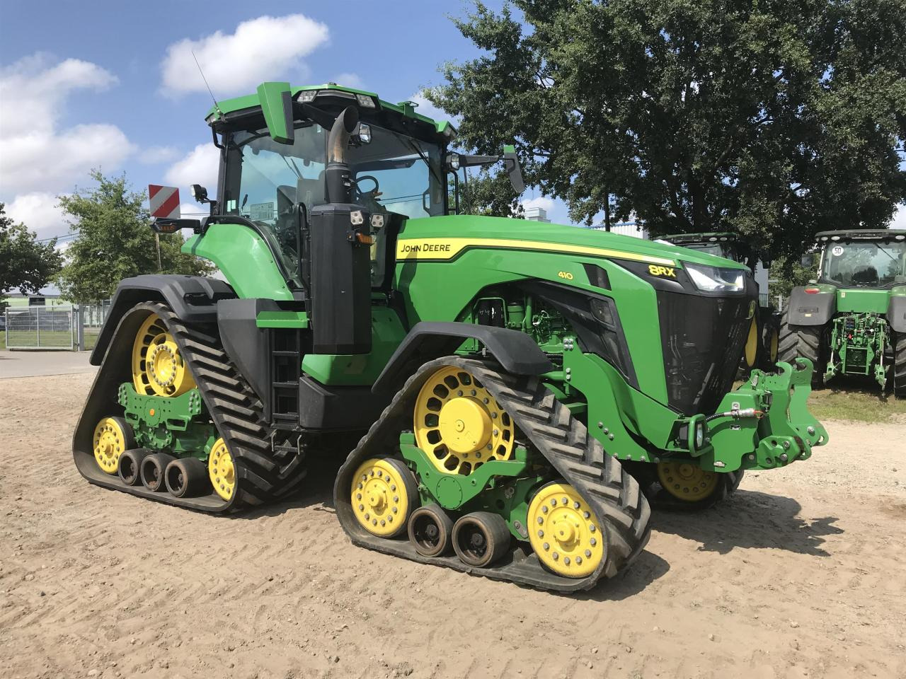 John Deere 8RX 410 - Τρακτέρ: φωτογραφία 1 John Deere 8RX 410 - Τρακτέρ: φωτογραφία 1