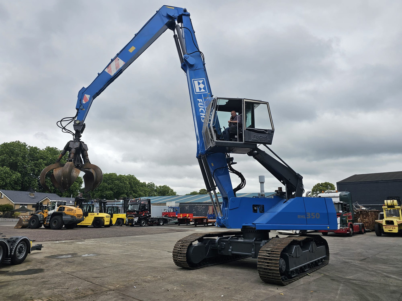 Fuchs RHL 350 Materialhandler With Adjustable Tracks - Μηχάνημα Διαχείρισης Υλικών: φωτογραφία 1 Fuchs RHL 350 Materialhandler With Adjustable Tracks - Μηχάνημα Διαχείρισης Υλικών: φωτογραφία 1